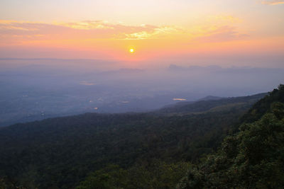 Scenic view of mountains against sky during sunset