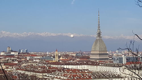 Cityscape against blue sky