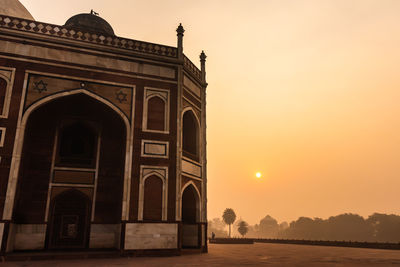 Humayun tomb exterior view at misty morning from unique perspective