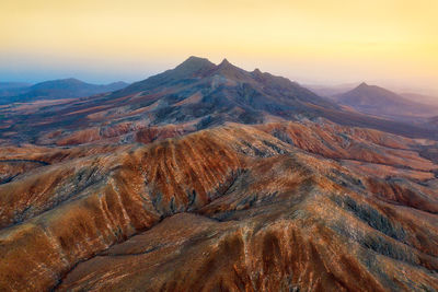 Aerial view of landscape during sunset