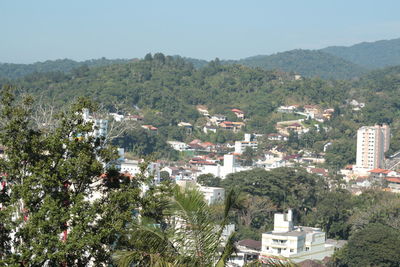 Scenic view of residential district against clear sky