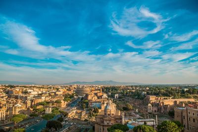 High angle view of townscape against cloudy sky