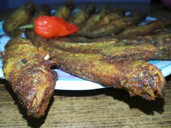 Close-up of meat on barbecue grill