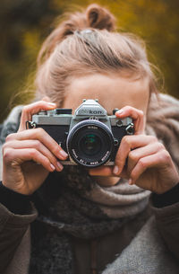 Close-up of woman photographing