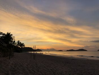 Scenic view of beach during sunset