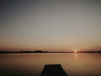 Scenic view of sunset over river