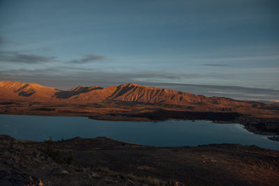 View of lake with mountain in the background