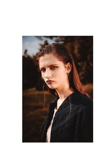 Portrait of young woman looking away