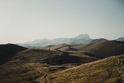 Scenic view of mountains against clear sky