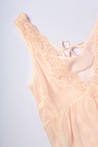 Close-up of dress against white background