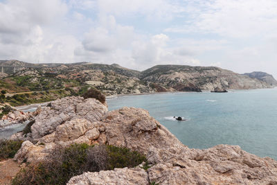 Wonderful beach in southern cyprus is named petra de romiou. view from rock on other rock