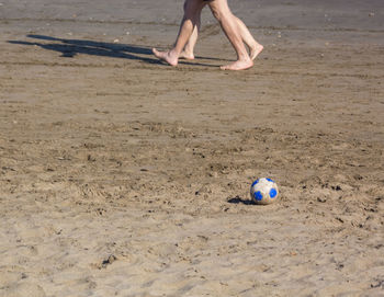 High angle view of soccer ball at beach