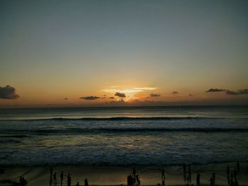 Scenic view of sea at sunset