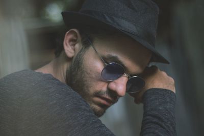 Side view of man wearing sunglasses