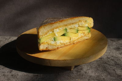 High angle view of bread on cutting board