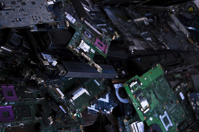High angle view of broken computer motherboards