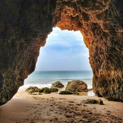 Scenic view of beach against sky