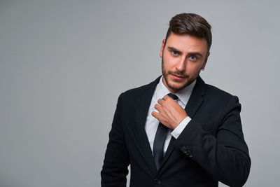 Portrait of man against white background