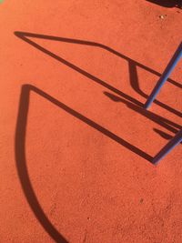 High angle view of basketball hoop on sand