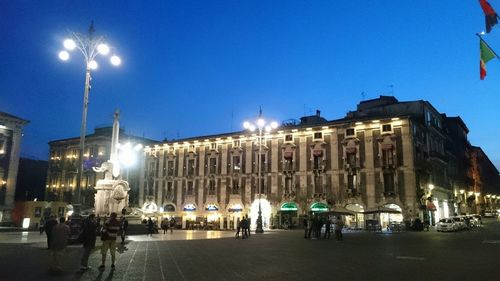 Illuminated street light at night