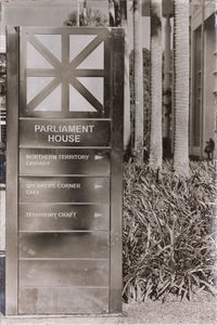 Text on wooden door of building