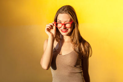 Portrait of smiling young woman