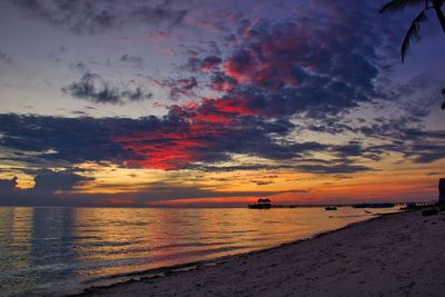 Scenic view of sea against  amazing sky during sunset