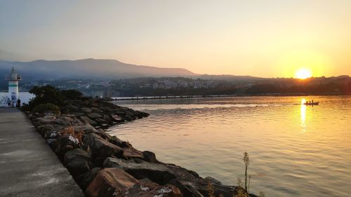 Scenic view of sea against sky during sunset