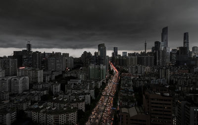 High angle view of street amidst buildings in city