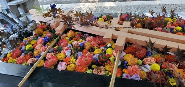 Multi colored flowers for sale at market stall