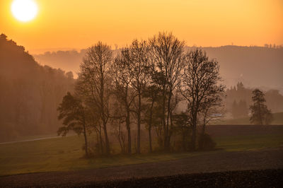 Scenic view of landscape at sunset