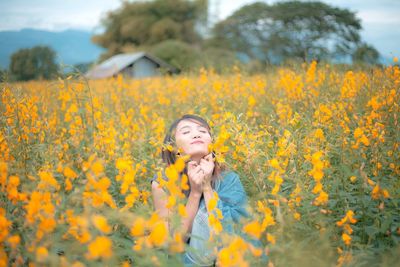 Young woman on field