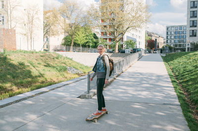 Woman standing in park