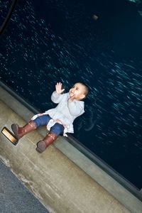 High angle view of friends enjoying at water