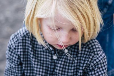 Close-up of boy with blond hair