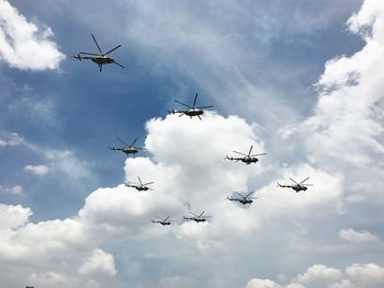 Low angle view of airshow in sky