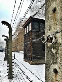 View of old building with snow covered house