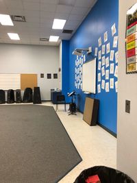 Empty chairs and tables in building