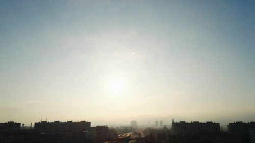 Cityscape against sky during sunset