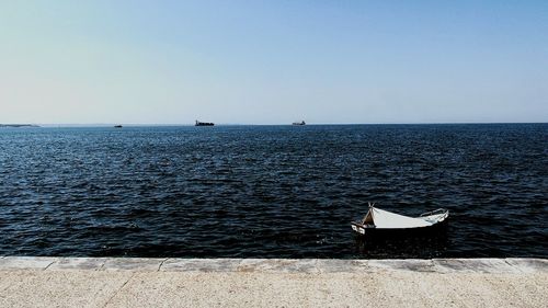 Scenic view of sea against clear sky