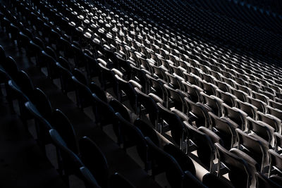 Empty chairs in stadium