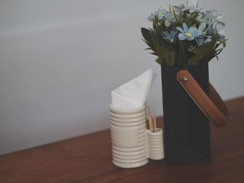 Close-up of vase on table at home