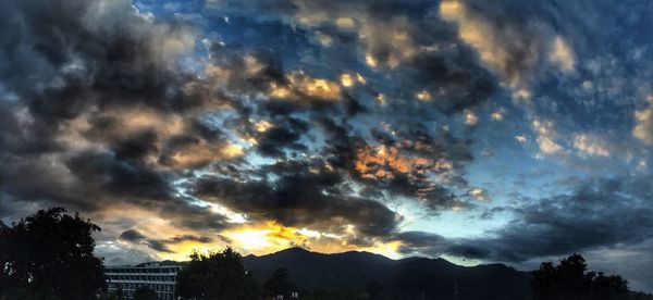 Low angle view of dramatic sky at night