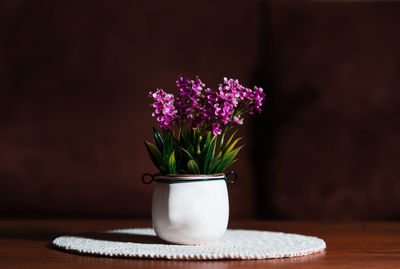 Close-up of flower pot on table