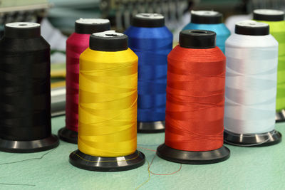 Close-up of multi colored objects on table