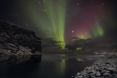 Scenic view of sea against sky at night
