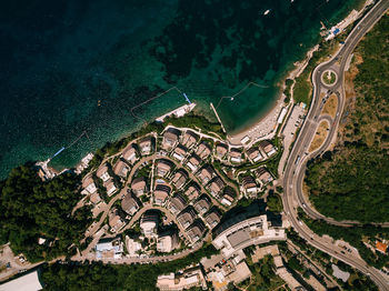 High angle view of city by sea