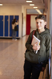 Teenage boy looking at camera