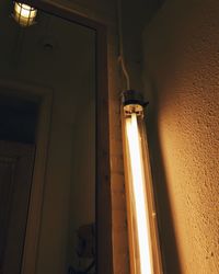 Low angle view of illuminated lamp