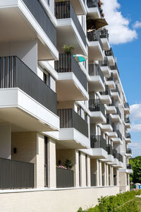 Modern apartment building with many balconies seen in berlin, germany